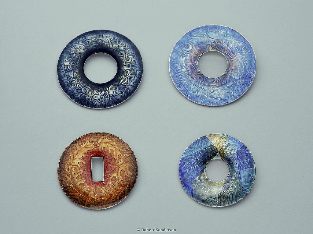 Four Brooches
