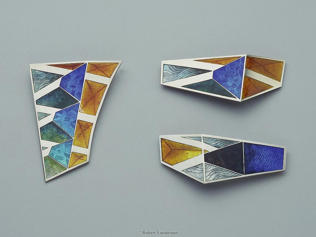 Three Brooches